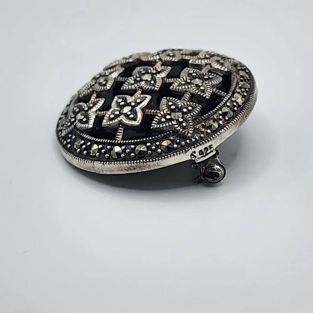 Vintage sterling silver black onyx marcasite brooch